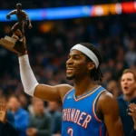 Shai Gilgeous-Alexander driving to the basket in a clutch late-game situation for the Oklahoma City Thunder